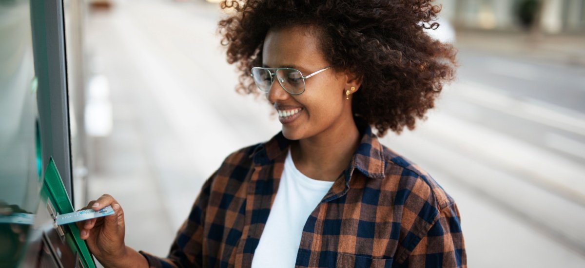 woman-withdrawing-cash-from-atm-using-debit-card-abroad